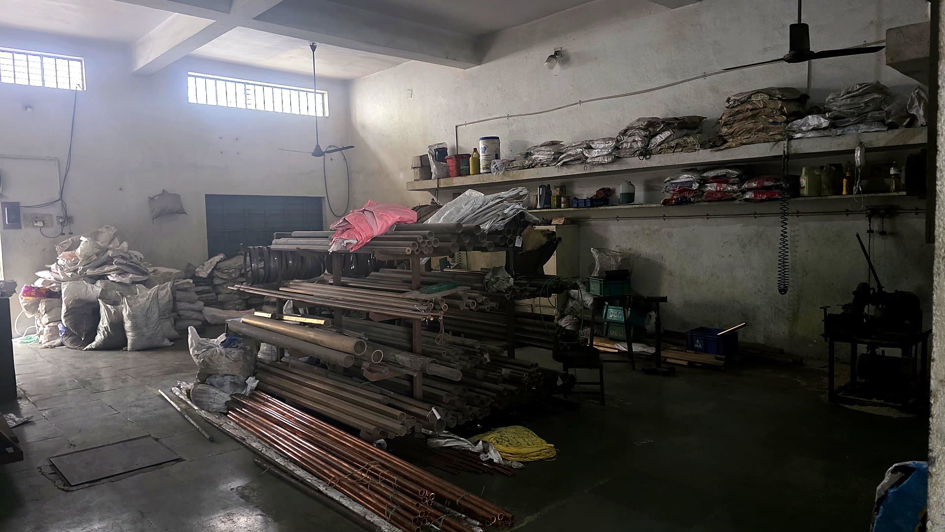 Raw material storage with brass and copper rods and tubes